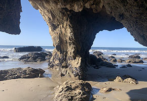 sunset inside the sea cave at El Matador Beach Malibu – most romantic secluded beach date Los Angeles 2025/26 Dating Guide